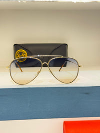 Ray-Ban aviateur, double pont et contours dorés, avec verres dégradés — photo réelle 1 de la paire chez NVL